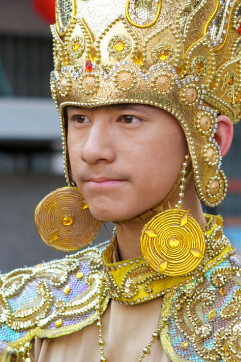 Тайский парень на костюмированном параде. Фото